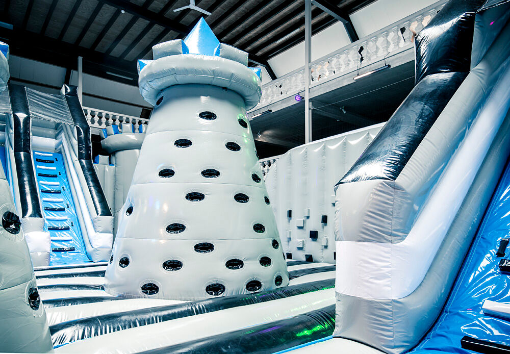 Climb Tower Mini obstacle in inflatable park – white and blue inflatable climbing tower with hand grips