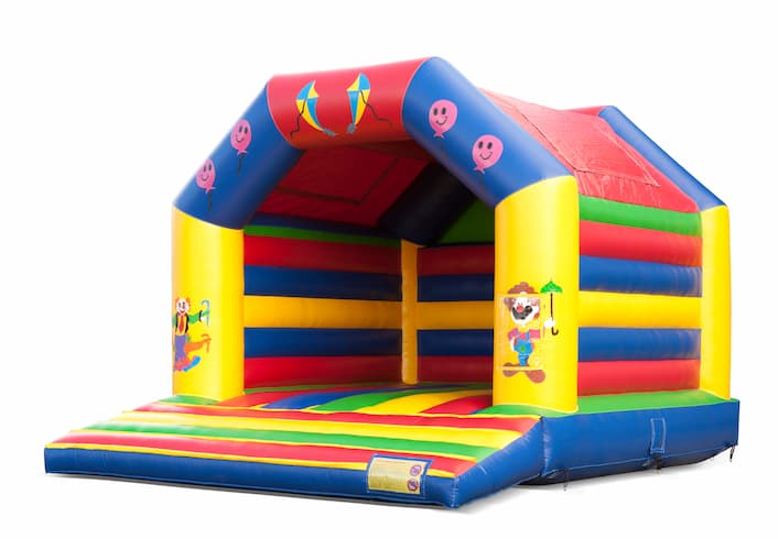Grande castello gonfiabile con tetto a tema circense in vendita per bambini. Disponibile su JB Gonfiabili Italia online