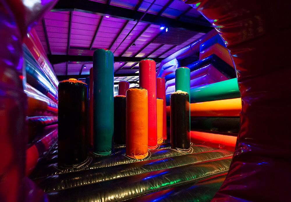 Pillar obstacles in inflatable park – colourful inflatable pillars as obstacles for running, dodging, and playing