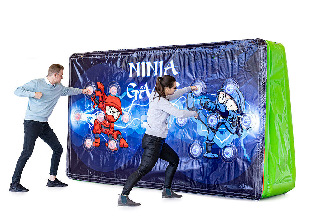 Buy a unique IPS Splash Wall - Ninja theme - action photo with a water spray on the top for both young and old. Order inflatable IPS Splash Walls now online at JB Inflatables UK