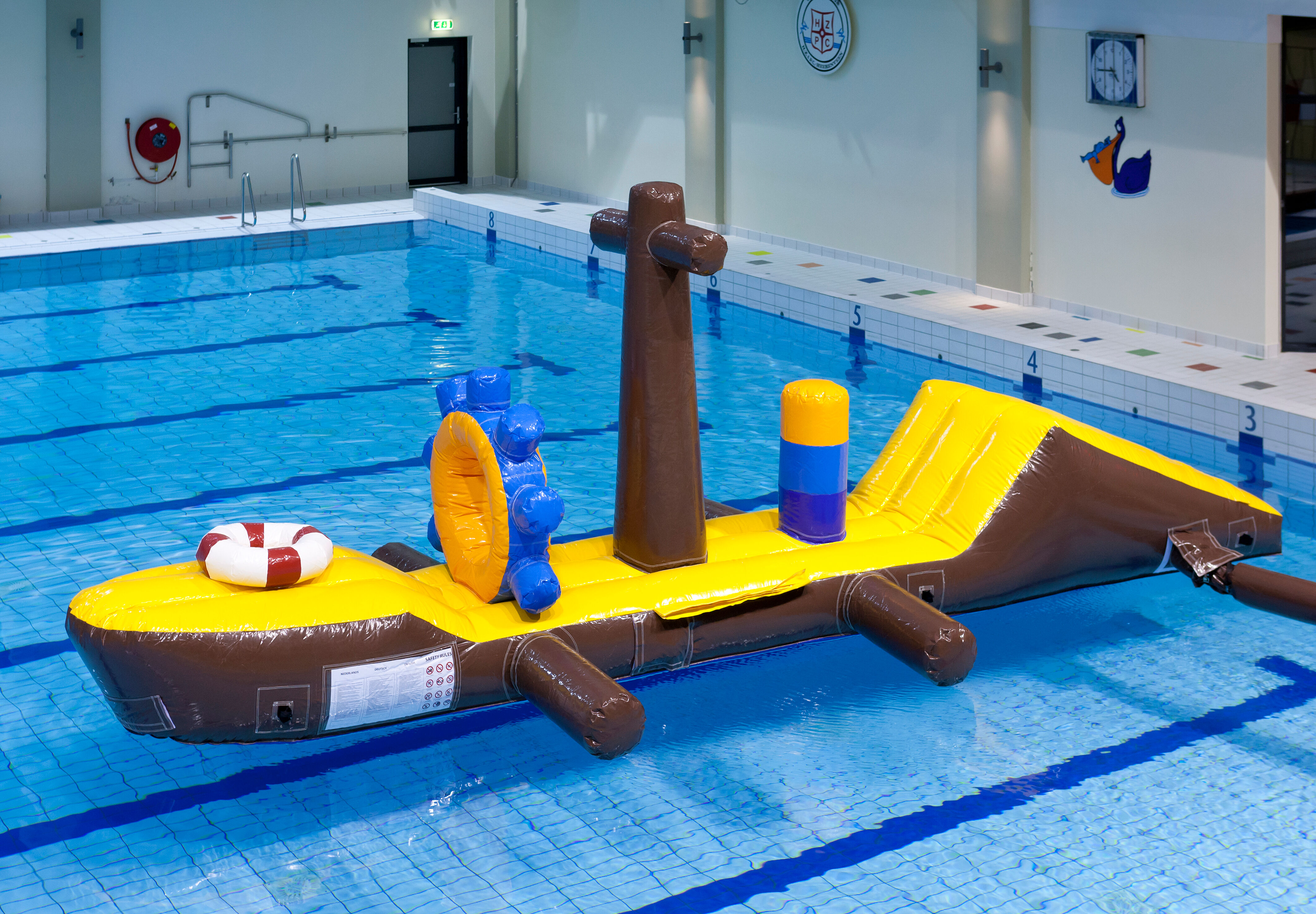 Buy inflatable 7 meter long assault course of a floating pirate ship for both young and old. Order inflatable obstacle courses online now at JB Inflatables America