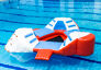 Order unique airtight inflatable triangle island in the colors red/blue/white for both young and old. Buy inflatable pool games now online at JB Inflatables America