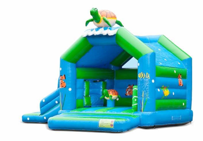 Buy inflatable indoor multiplay multifun bouncy castle with slide in turtle theme for children. Order inflatable bouncy castles online at JB Inflatables UK
