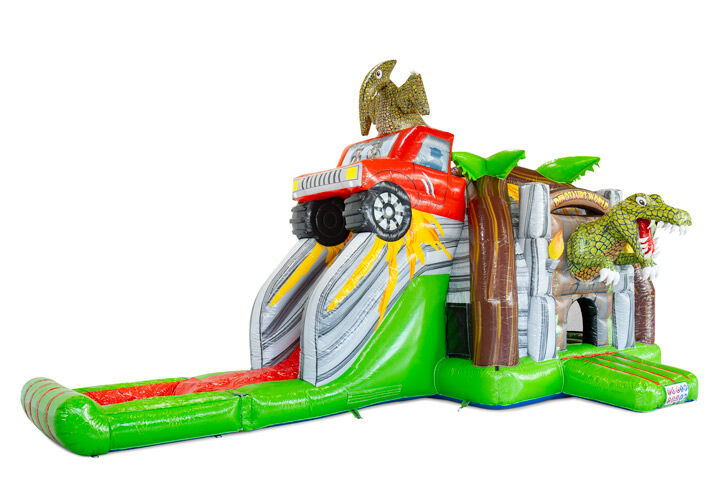 Castello gonfiabile per bambini con scivolo e ostacoli a tema Jurassic Park.