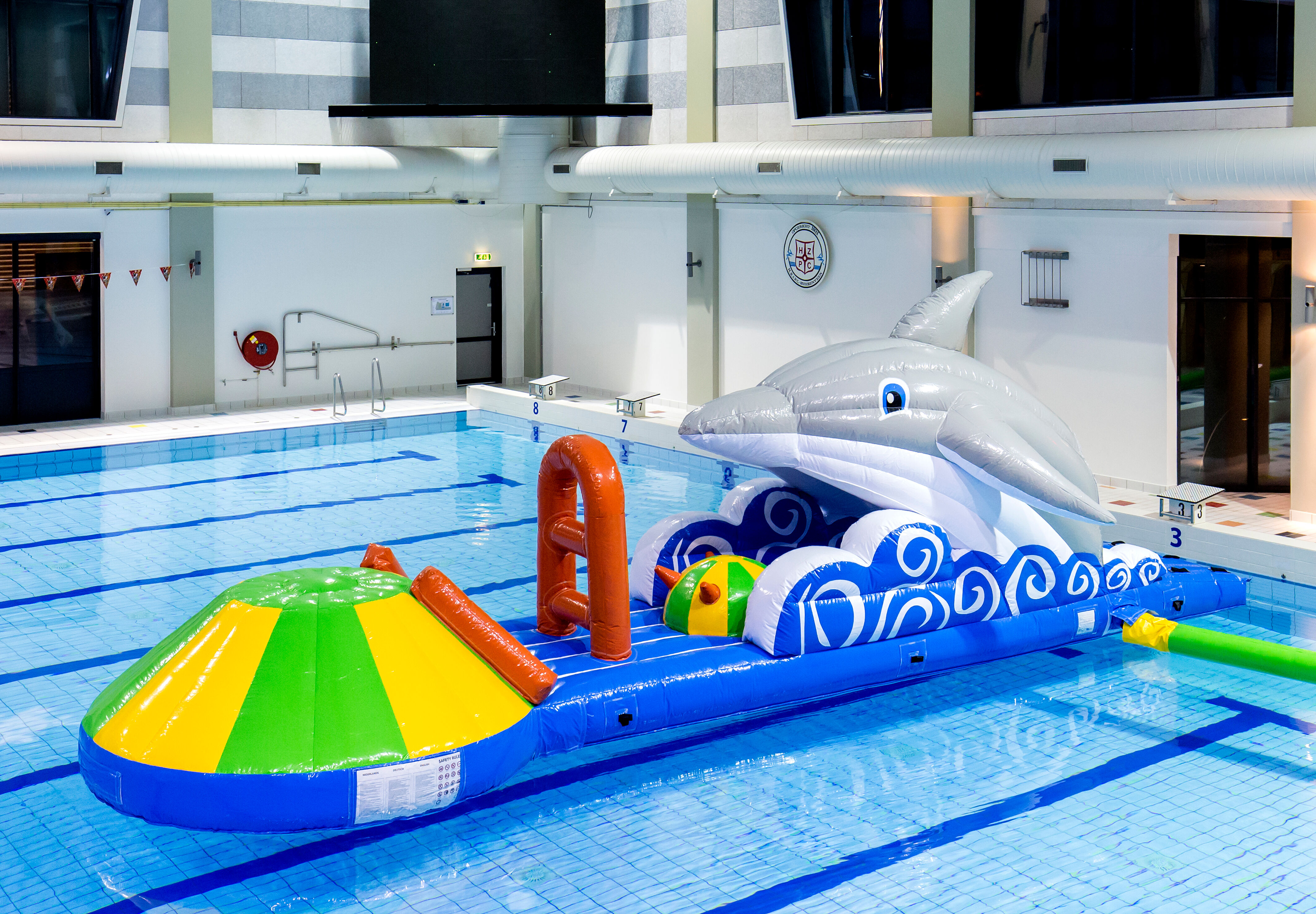 Order an inflatable slide in a dolphin theme for both young and old. Buy inflatable water attractions online now at JB Inflatables America